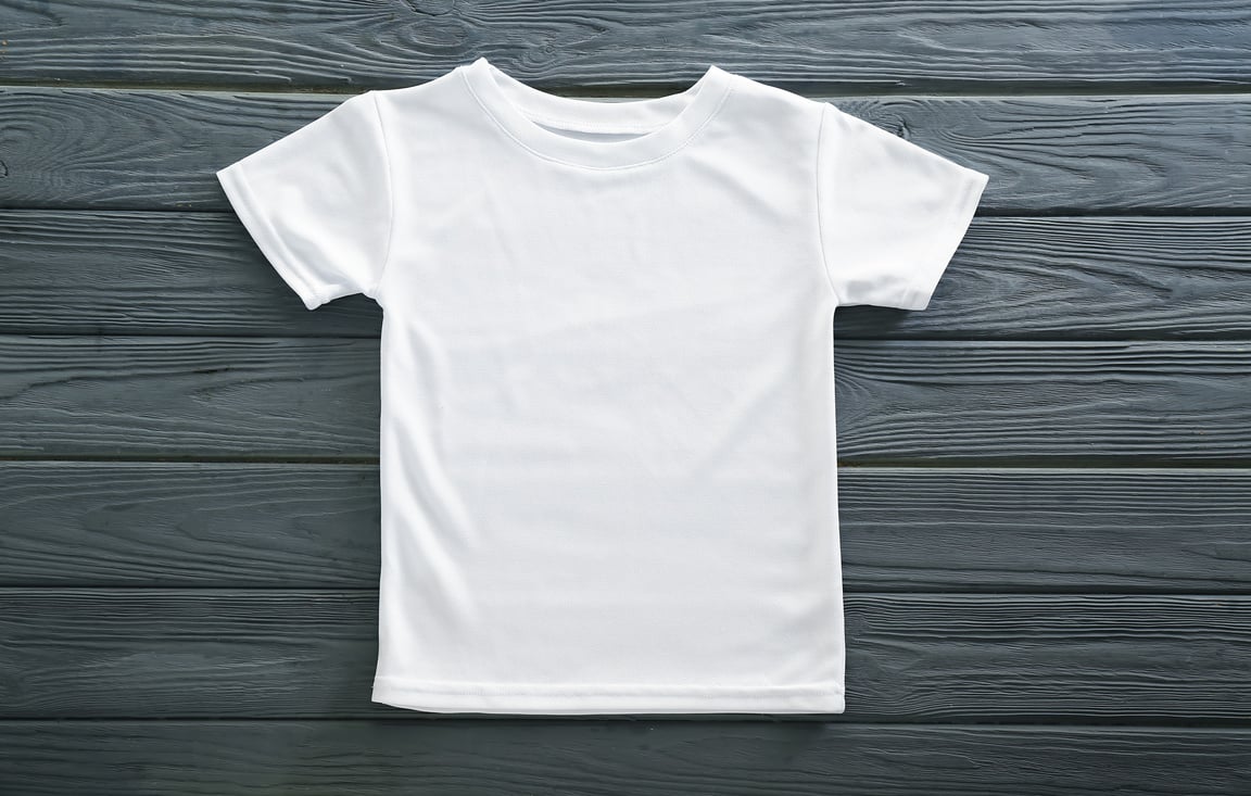 Blank White T-Shirt on Wooden Background